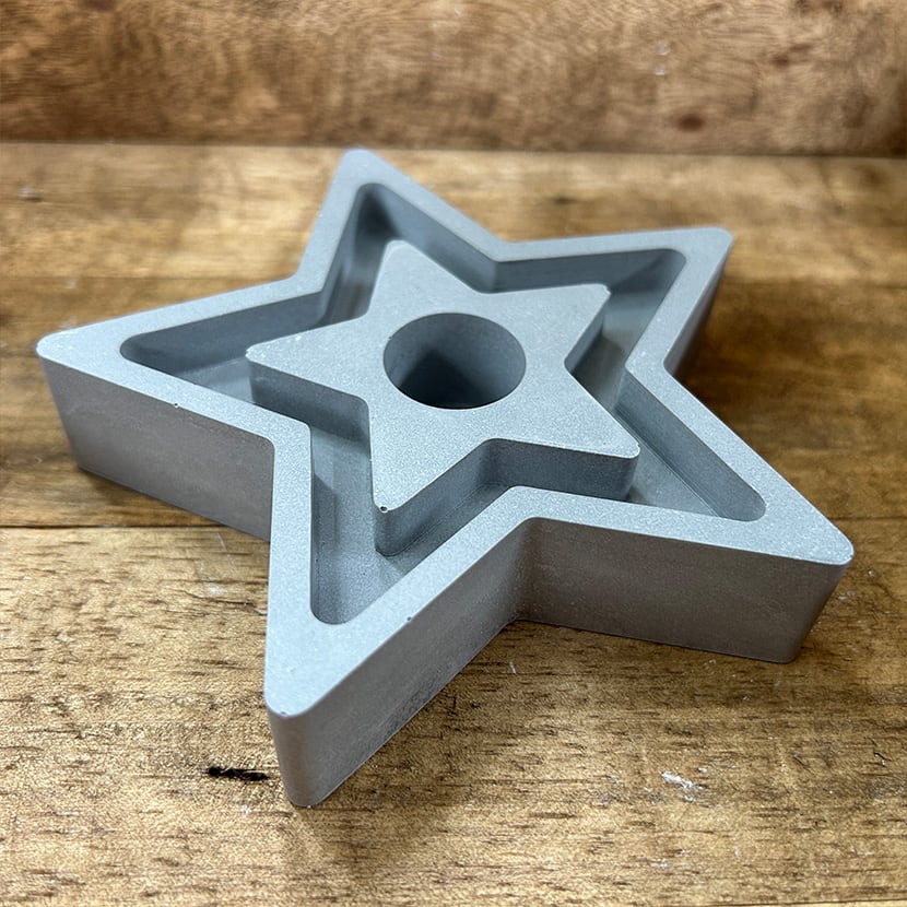 Kerzenhalter Stern in Grau
