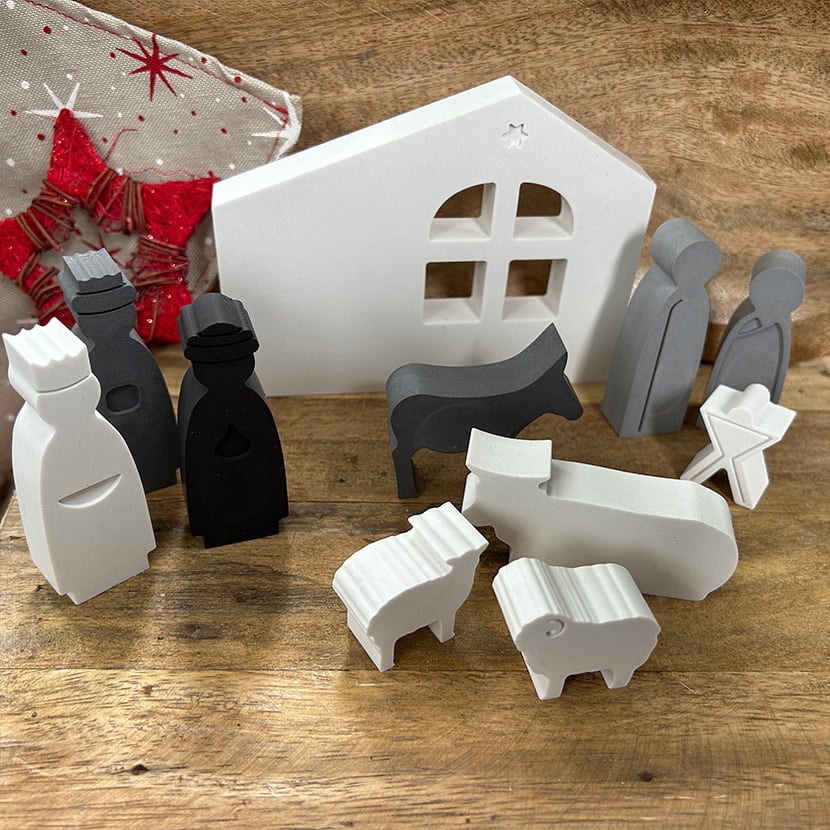 Krippe mit Einzelmotiven in Graustufen